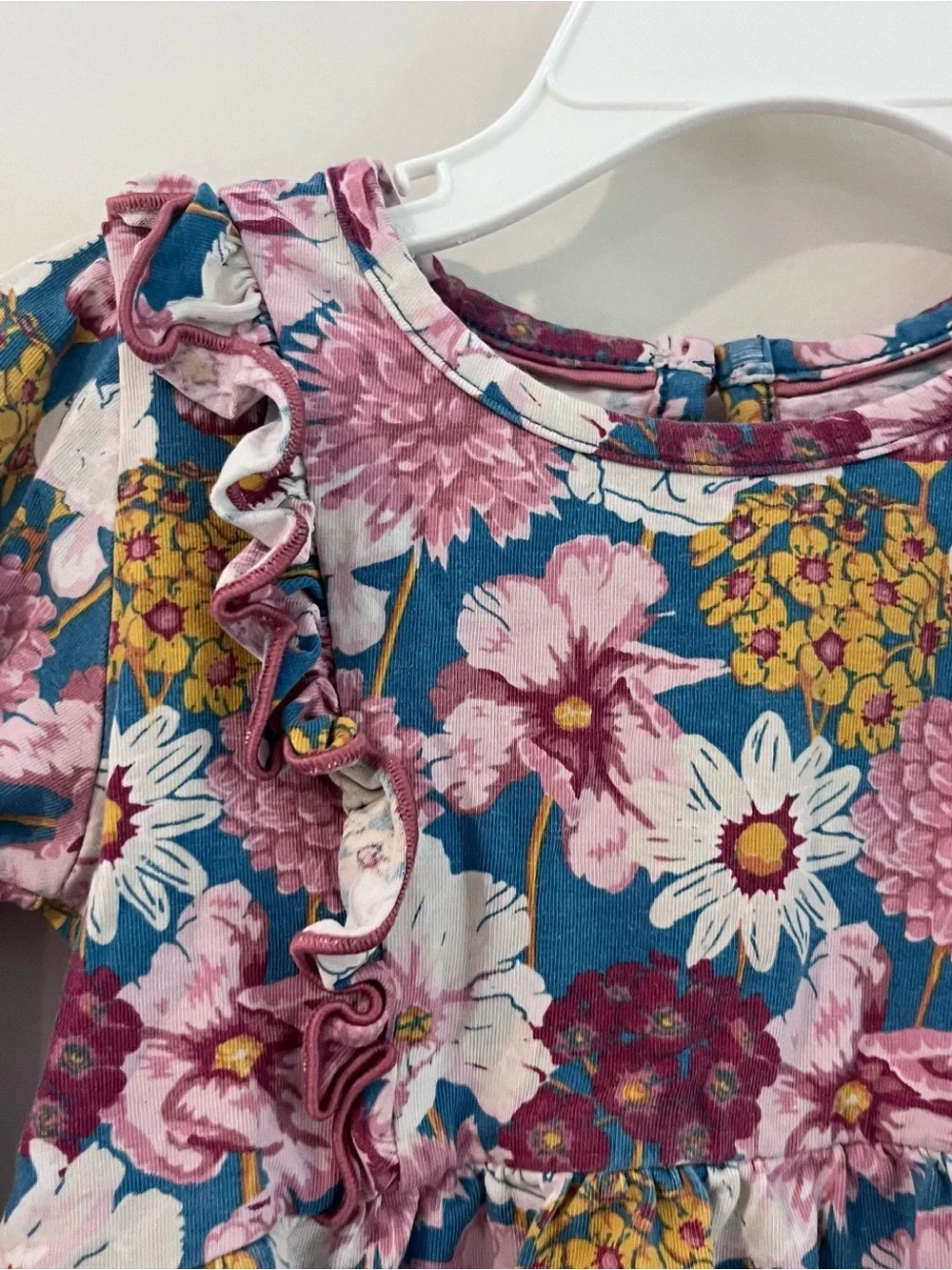 Ruffle Butts playful floral